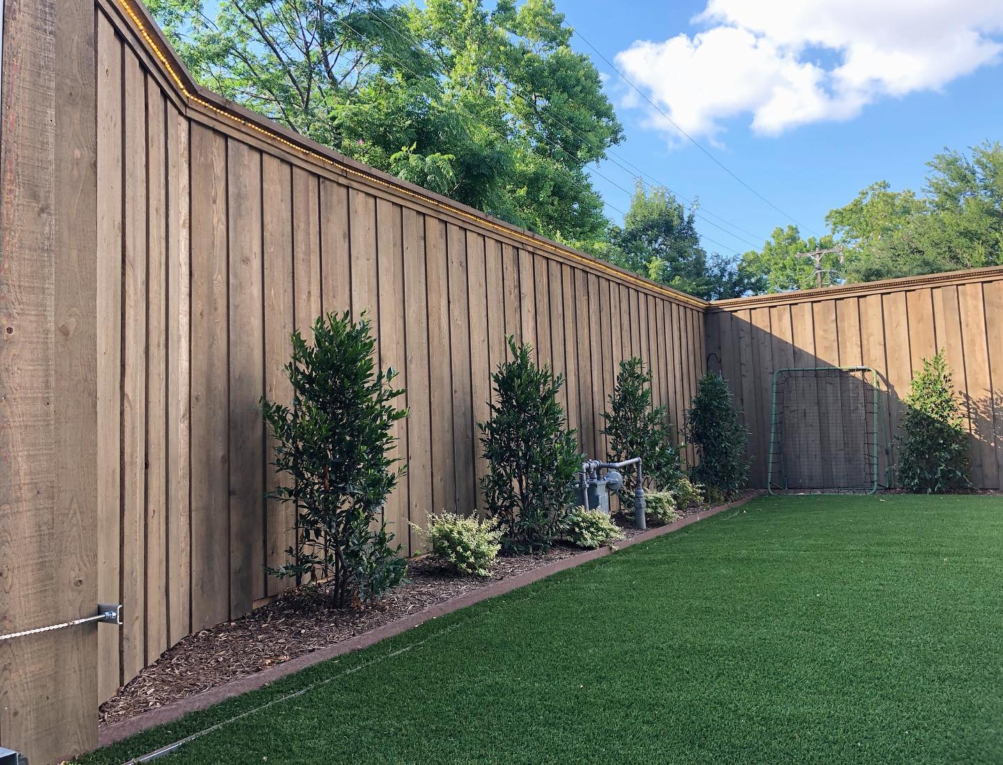 A traditional fence will never go out of style, but we always prefer the cleaner look of clear cedar wood. It elevates the fence and gives it a more modern look. If you look closely, you'll see that we added a string of lights to the trim of the fence. Do you like it? Comment, like or share! ❤️👍🏼

#customfence #fencing #woodfence #cedarfence #modernfence #dallasfence #dallasfencing #fencing #customfencing #texasfence #texascontractor #dallascontractor #dallasconstruction #texasconstruction #outdoorliving #homeimprovement #backyard #backyardfence #customwork #dallasbusiness #texasbusiness #traditionalfence #custommetalfabricator #dallaswoodworks #bhfyp